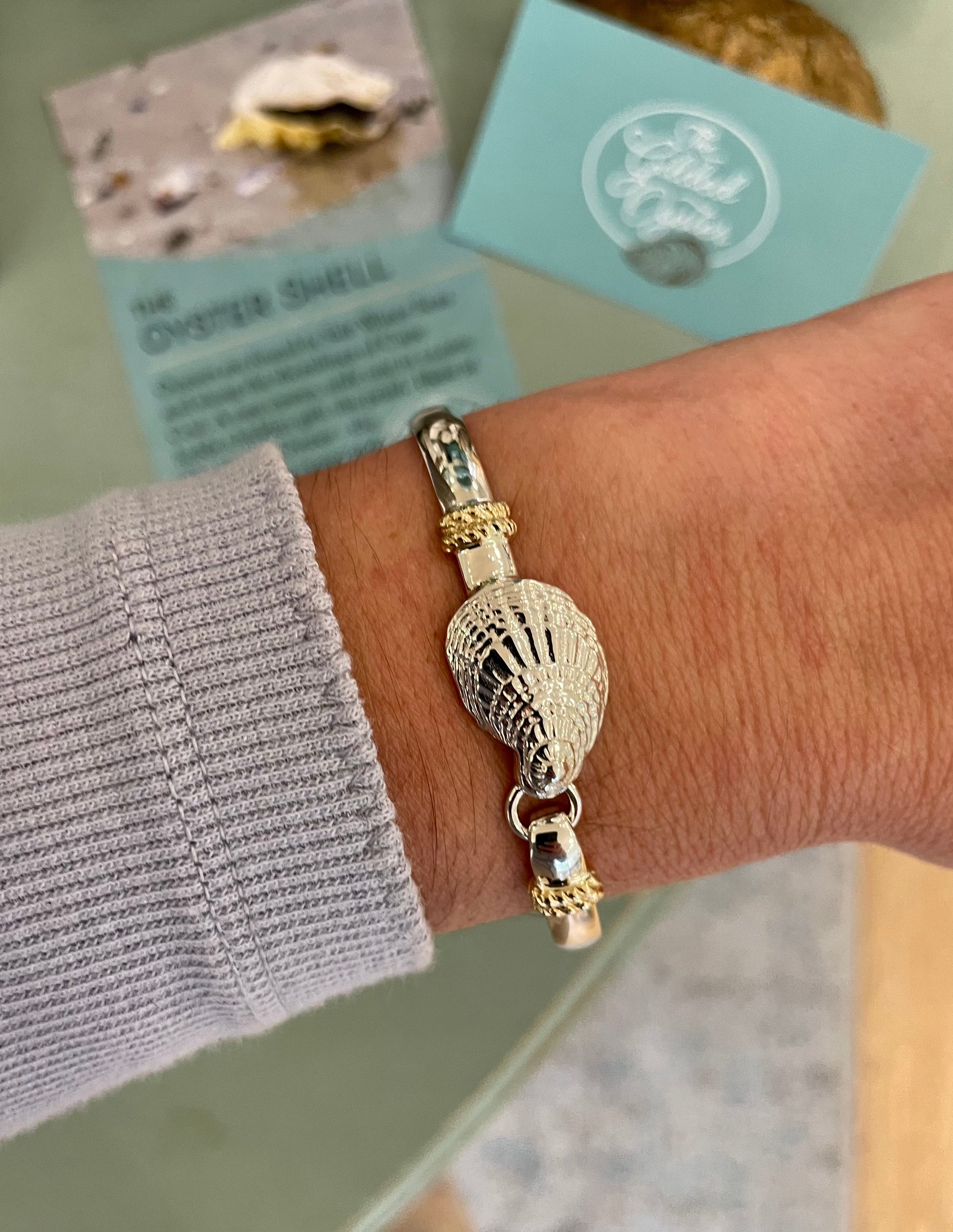 Our Exclusive Polished Bracelet with Textured Oyster Shell Sterling Silver with 14K Yellow Gold Wraps The Gilded Oyster